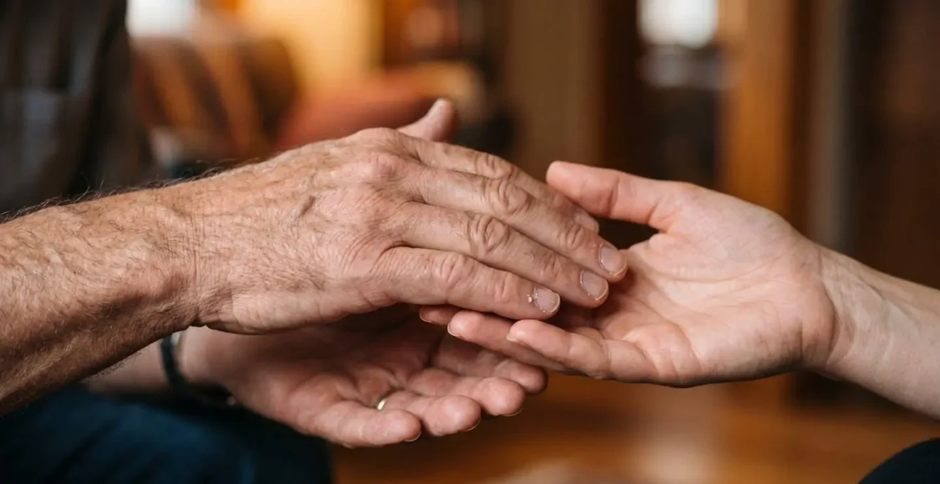 Close-up of hands in gesture of openness during meaningful conversation
