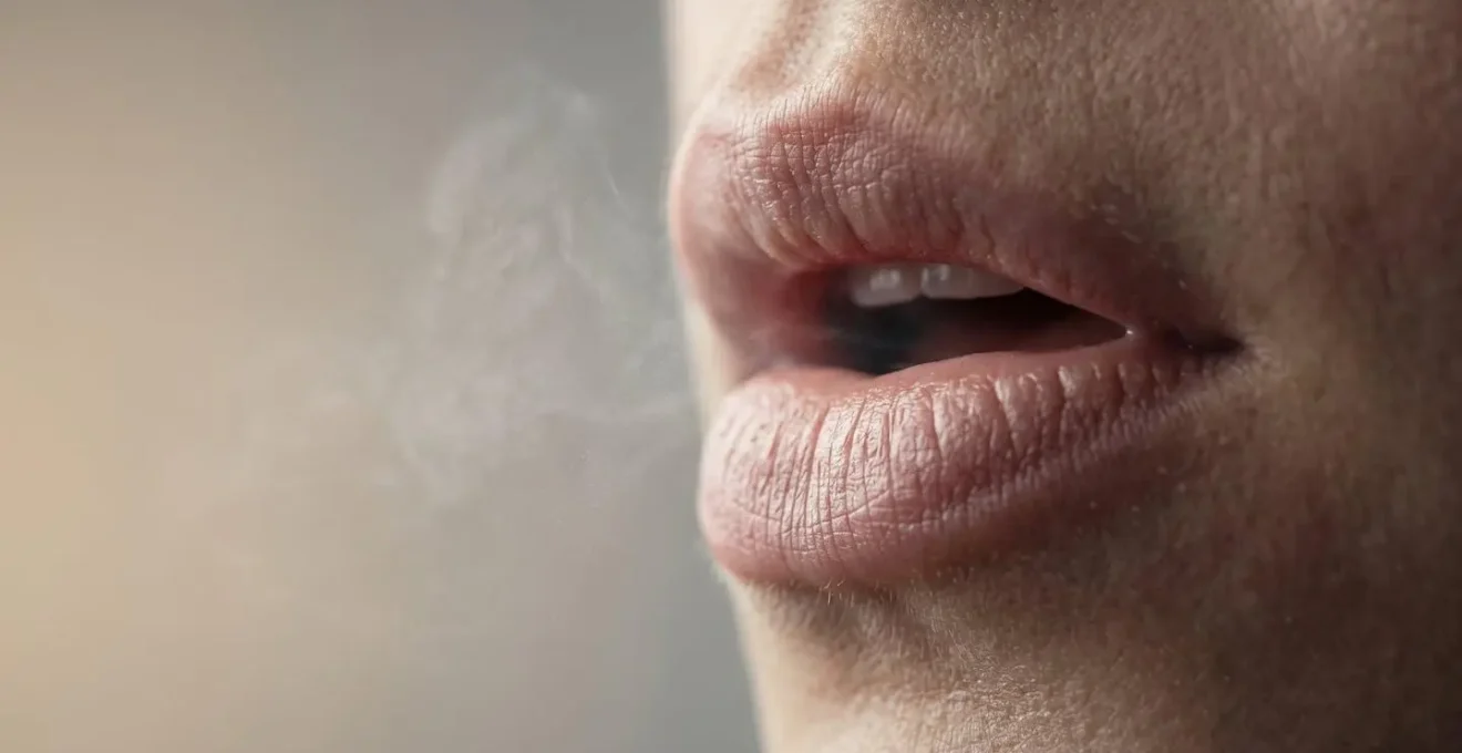 Close-up macro detail of vocal vibration and breath during humming practice