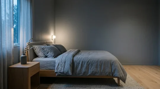 Serene modern bedroom designed for optimal sleep with cool ambient lighting and minimalist aesthetic